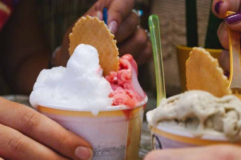 tour guests holding cups of gelato during San Francisco food tour